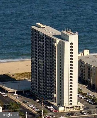The 9400 Condominium Building is located directly on the oceanfront between Coastal Highway and the Atlantic Ocean at 94th St. A huge concrete oceanfront pool deck, fitness center, free Wifi, plus other amenities offered in a convenient midtown location close to many restaurants and shopping. You can see the ocean plus the bay from almost every room of this spacious condo with a popular split floor plan offering two private separate bedroom suites each with a full bath, plus it is furnished to provide you and your family plus friends, years of memories at your dream property at the Ocean. Priced to sell quickly for you to enjoy this Summer. Life is Better at the Beach! Call today to see this magnificent property.