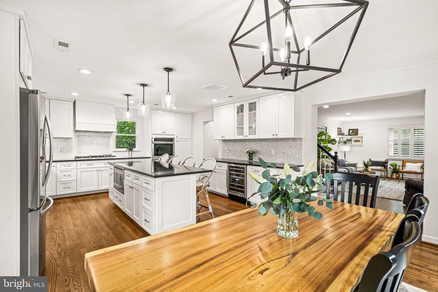 Available for private showings and easy to schedule. Classic charm meets modern comfort in this beautifully updated 5-bedroom, 4-bath colonial in sought-after Beverley Hills. Perfectly sited on a picturesque, tree-lined street, this sun-drenched home features thoughtful upgrades throughout and a layout ideal for both everyday living and entertaining. The 2022 addition created an open kitchen and dining room with Primary and Ensuite above. The house now totals about 2,948 square feet.

✨ Highlights:
Gourmet kitchen with white, Wolf Classic cabinetry, quartz countertops, high-end appliances,  8.75 ft breakfast bar and 46 bottle wine fridge.
Elegant living room with a wood burning fireplace and custom built-ins
Main level office/guest bedroom (or private dining room) and full bathroom.
Wood floors throughout. Shutters throughout main floor. Halo smart lighting.
Spacious primary suite, 2 closets, one is walk-in, spa-like en-suite bath and laundry
Fully finished lower level with family room, full bath
Private, fenced backyard with flagstone patio and lush landscaping
Driveway for off-street parking
All new HVAC, 2 zones
All new James Hardie siding, 2022
Ting fiber internet

Short walk to Cafe Pizzaiolo, St Elmo's coffee, Ramparts Sports Bar and Baskin Robins. Easy walk across the bridge to Shirlington for tons of local restaurants, a library, movie theater and local theater. Located minutes from Del Ray, Old Town Alexandria, and DC, this home offers unbeatable convenience with a small-town neighborhood feel. Zoned for Charles Barrett Elementary and near multiple parks and playgrounds. Monticello Park for trails, bird watching, a creek and small, off leash area for dogs.

Call or text the Listing Agent for private showings!