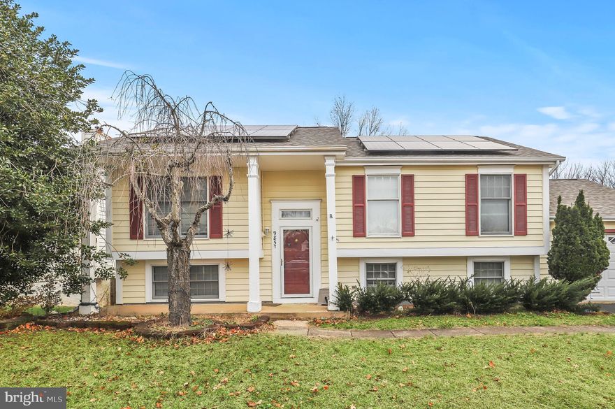 Welcome to 9857 Nimitz Ct!  Wonderful split foyer located on a quiet street in Manassas.  Backs to woods for lots of privacy if you should decide to fix up/keep the above ground pool in the backyard.  The large deck is great for entertaining or just relaxing with your morning coffee or after work in the spring, summer and fall.  This home is being sold as-is but has so much potential with some paint and carpet to freshen it up.  The kitchen has Silestone counters, white cabinets with glass in the doors.  Main level has beautiful light color hardwoods.  Large family room with high cathedral ceiling.  There are 3 bedrooms and 2 full bathrooms upper level, 2 bedrooms and 1 full bathroom lower level.   Also a large rec room in the lower level that walks out to the backyard.    Lots of big ticket updates done, roof replaced 2021 (solar panels have been removed), hvac, water heater and windows all replaced about 5 years ago.