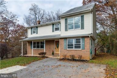 OPEN HOUSE SUNAY SEPTEMBER 23, 2018 AT 12 NOON!! ALMOST Three master bedrooms! 5 bedrooms 4 full baths, single family house. LARGE Wooded back yard, huge deck, unfinished basement for lots of storage. hardwood floors, crown molding. This property has some disability access on the main level. Great size rooms, ready for a new family.