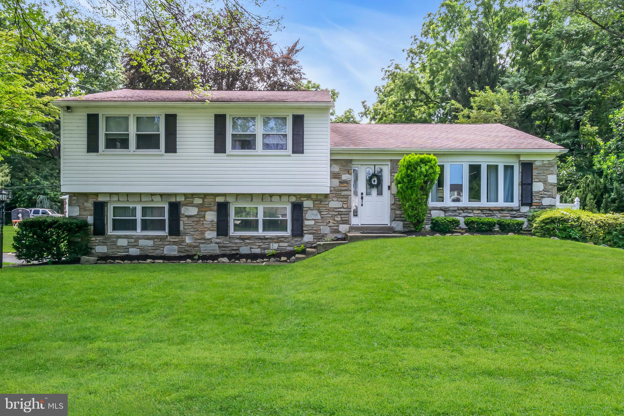 Welcome to 366 Pheasant Drive! This 2700 square foot home is located on a large Cul de Sac surrounded by beautiful mature trees in the award winning Lower Moreland School District, just walking distance to the Elementary School. As you walk into this home you will be impressed by the new commercial-grade EVP flooring throughout the entire first floor. The gorgeous, open, fully renovated kitchen features new stainless steel GE Cafe appliances, new counters, cabinets and good sized pantry. The door off the kitchen leads to a lovely covered porch. A great spot to have your coffee in the morning or a barbecue with friends on those warm summer evenings overlooking the backyard. The sun-filled Living Room has a large wall of windows and opens to the Dining Room which is perfect for entertaining family and guests. Upstairs you will find 3 spacious bedrooms with beautiful hardwood floors and a full hall bathroom. The primary suite has its own full bath with walk-in shower and double vanity. On the lower level there is a large cozy family room with a beautiful wood burning fireplace perfect for those cool winter evenings. Large sliding doors open to the beautiful backyard. Note the new tile floor from garage door entering house to laundry room and half bath which were also both just remodeled completely. The entire exterior of the home, porch and shed are freshly painted. Additional recent updates include 12 new windows, recessed lighting throughout, new ceiling fans in the bedrooms, new high efficiency furnace and hot water heater, new storm door, exterior spotlights and an upgraded alarm system. Talk about move in ready! Schedule your showing today.