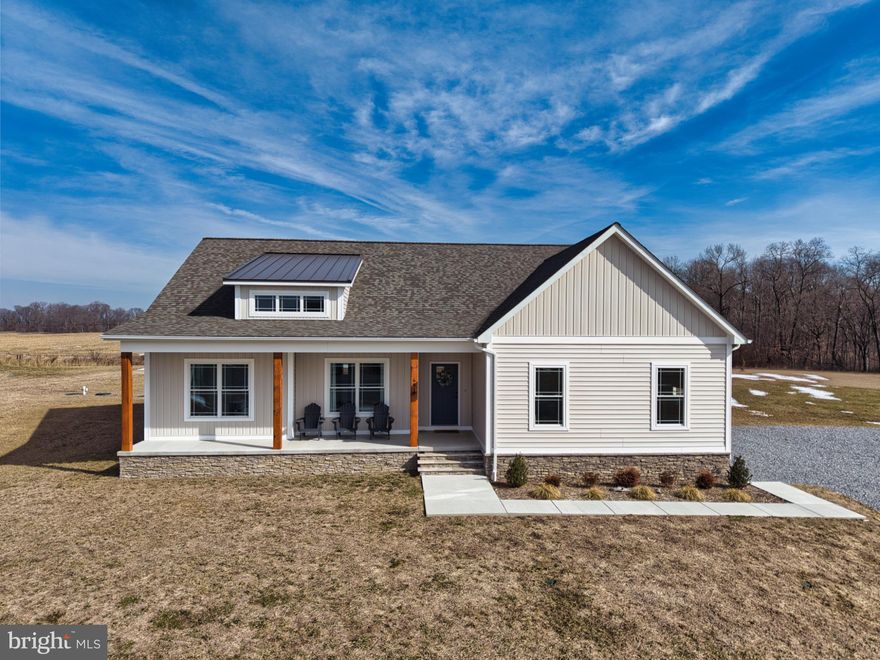 No need to wait for new construction when this beauty is ready to WOW you! From the moment you step inside your attention will be drawn to all the little details that make this property a show stopper... Wood beams on the soaring ceilings, huge center kitchen island with storage on both sides, gorgeous engineered flooring, screened porch built on a cement foundation not decking, shadow box detail and so much more. You'll appreciate the generous primary suite on one side and two additional bedrooms with full bath on the other side of the first floor. Multiple living spaces, cozy propane fireplace, laundry room off attached garage that will actually make you want to do the laundry! Upstairs is a nicely sized bonus room complete with a mini split perfect as a home office, family room or guest room. Sellers made a number of after construction upgrades. To put it simply, you will love everything about this home! Completely turnkey.
