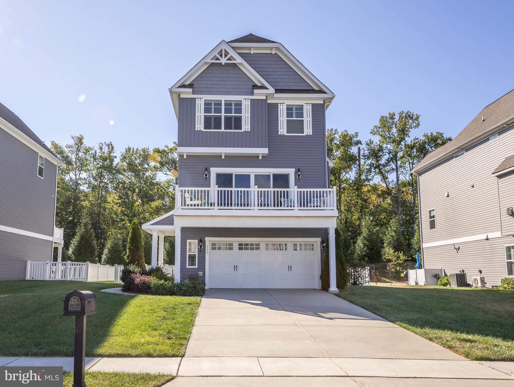 Pristine 6 Yr Old Colonial with Stunning Water Views, a Deeded Boat Slip and Marina! Welcome to this beautiful 3-story colonial with 3 finished levels of living space located in the well maintained water oriented community of Gablers Shore . This home features 3 bedrooms, 2 full & 2 half baths, a 2-car garage, fully finished basement, 2 Trek Decks, over 2,400 sq ft of living space, and fully fenced in rear yard. The foyer greets you with attractive hardwood flooring, interior garage access and a rod iron spindle staircase ascending to the open concept main level. A large bright & spacious living room is adorned with wood exposed beams, wide plank engineered hardwood floors, gas fireplace w/mantel, ceiling fan and large slider leading to front deck with stunning water views. The sleek gourmet kitchen is a chef’s dream with soft close cabinetry, 6 ft island, quartz countertops with porcelain farmhouse sink, stainless steel appliances, gas cooktop, double wall oven, large 5x5 pantry, hardwood flooring, recessed & pendant lighting, and stainless steel backsplash. The kitchen opens to the spacious dining room featuring a large slider leading to the rear deck. Ascend the staircase to find a generous primary suite with beautiful herringbone pattern luxury vinyl flooring, a large 8 x 6 walk-in closet with closet organizer, ceiling fan, and a primary on-suite bath—complete with a large walk-in shower with bench and ceramic tile surround, double sink, and ceramic flooring. Down the hall, you’ll find a french door laundry closet, hall linen closet full bath with shower/tub combo and linen closet, and two additional spacious bedrooms—each with herringbone pattern luxury vinyl flooring, french door closets, plantation shutters, and ceiling fans. In the lower level you will find a bright and spacious fully finished basement featuring a large family/rec room with ample natural light, luxury vinyl flooring, recess lighting, and slider walkout to the backyard 11 x 21 concrete patio. Enjoy time outside on either the 5 x 14 front deck with water views or the large 12 x21 Trek deck with ascending staircase to the fully vinyl fenced backyard. Highlights include 2021 Upper Level & Lower Level Luxury Vinyl Flooring, plantation shutters on all windows. The Gabler's Shore community is a waterman's dream including a boat slip (#32) for you to keep your boat or jet ski, bay access, covered pavilion with grills & fire pit, and opportunity for dock fishing! Close proximity to shopping amenities, restaurants, schools, and I-95. This luxurious home is the perfect place for tranquil unwinding or an entertainers paradise!