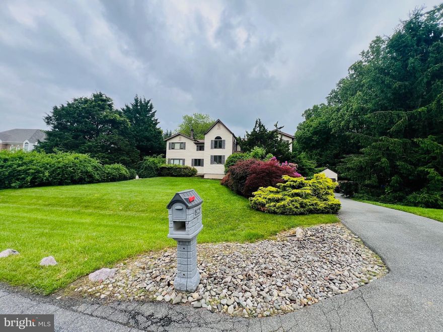 Available 1/3/2026 - or possibly sooner - for lessee move in. Custom built home on 2.25 acres, backing up to private woods in the sought after Cloverly section of Silver Spring - complete with large koi pond, outdoor entertainment space with fireplace and grill. This kind of unique home, minutes from DC, approx. 6 mi to Redline metro, is rarely available as a lease. Light-filled, generous sized rooms, including built in-cabinetry, marble and granite countertops, recently refinished oak floors, crown molding, wainscoting, and many detailed finishes throughout. Two-story foyer with oversized staircase; gourmet kitchen; formal dining room with amazing view to the backyard; large fully conditioned sunroom. Great for entertaining. Two-story atrium-style eat-in kitchen area is highlighted by light streaming through the open-concept second floor balcony and skylights. The private office/library is surrounded by built-in, maple bookshelves and many windows. Gated and largely fenced backyard. Upstairs, 4 large bedrooms including the primary with walk-in closets and private bath. The basement has a bar, sitting / game area and an additional full bath. New HVAC, water heater and other system upgrades. Take a stroll down the landscaped rock path to the back and out the gate to walking trails. In addition to a two-car attached garage, a one-car garage is attached to a large, detached workshop. The workshop and 3rd detached garage that is attached to the workshop building is not included in the lease price - landlord wants to use as long term, rarely accessed storage. Workshop lease negotiable for additional price. Pets permitted on a case-by-case basis with additional security deposit for each pet. Tenant is responsible for all utilities (electricity, propane, internet, phone, etc.); tenant is responsible for lawn care. Note: HVAC is a heat pump and propane is only used as backup / supplemental source, some cooking appliances; and may also be used for fireplace. Owner will arrange for professional pond maintenance. Repairs subject to home warrant deductible. Repairs to be done via home warranty first.