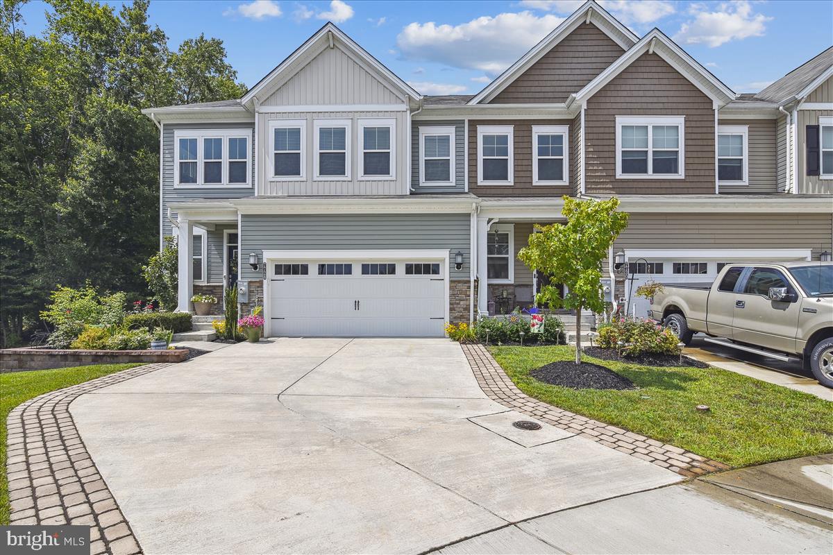 HOLLY RIDGE VILLAS... One of a kind Villa Style home in awesome Holly Ridge community ** Exquisite Magnolia model is 2540 sq ft above grade plus finished basement ** Two Story Foyer with lots of light and amazing wainscoting ** Open floor plan with dining room and family room open to white kitchen with oversized island and lots of cabinets, granite counters, and stainless steel appliances ** Den/office on main level ** Upstairs there are 3 bedrooms, plus a spacious loft and 2 full baths** The Owner's Suite has a tray ceiling and is 16x20 with French doors and two walk-in closets**The master bath has a double vanity and an oversized walk-in shower**The laundry room is on the second floor. The basement is finished with a recreation room and a 4th bedroom and a full bath** There is a two-car garage ** The Lot is the best one in the neighborhood siding to a park and backing to the woods ** This home has custom features throughout. This is a "smart" home. There are Gleaming floors. Excluded: Alexa, Echo Show and Echo Dot, and Sonos Play (wireless speaker)