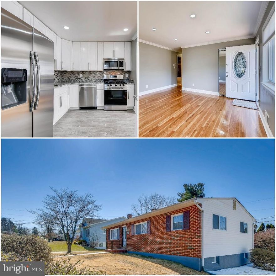 Beautiful 5BD/3BA Home w/brand new flooring throughout, crown molding, & new light fixtures. Gourmet Kitchen w/ SS appliances, granite counter tops, & stylish back-splash. Master on 1st floor w/ full BA  & additional Master w/ full BA in LL. Come take a look!