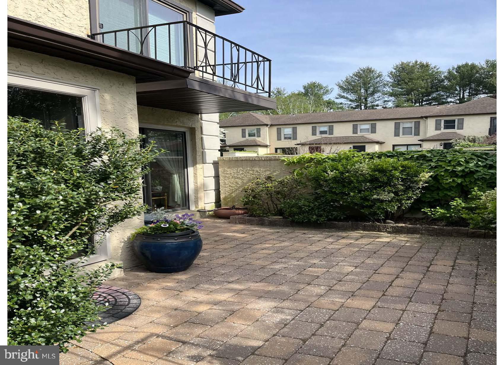 This end unit townhome features two beautifully landscaped courtyards, 2 bedrooms and 2.5 baths with hardwood flooring throughout. First floor features, living room, dining room and an eat in kitchen. Kitchen features new dishwasher and induction stove top. Enjoy the gas fireplace in the den area. Both bedrooms on second floor have large closets and 2 full baths. The finished lower level boasts additional living space with exceptional storage. Lower level has been fully water proofed with french drain, and sump pump and new hot water heater.
Millridge residents enjoy the Manor House, available for social events , guest quarters, and a heated swimming pool, including a pool house with all the amenities. This unit has 2 reserved parking spaces and with ample guest parking. The community is just a 15 minute drive from center Wayne and fine dining. Millridge sits on over 30 acres and 120 homes, where nearby trails are plentiful for walking and hiking. Don't miss out on this beautiful end unit.