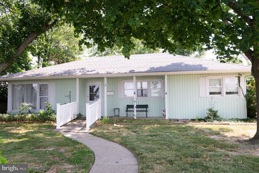 Cambridge - 3 BR, 1 1/2 bath home located next to the Cambridge Harbor redevelopment property.  
This home offers water views and a quick trip to Sailwinds Park and the Visitor Center.  Bright mid century design with new flooring, den with fireplace and one floor living. Efficient gas forced air heat and central air.  Brick patio area and partially fenced rear yard.  Large outbuilding/workshop.