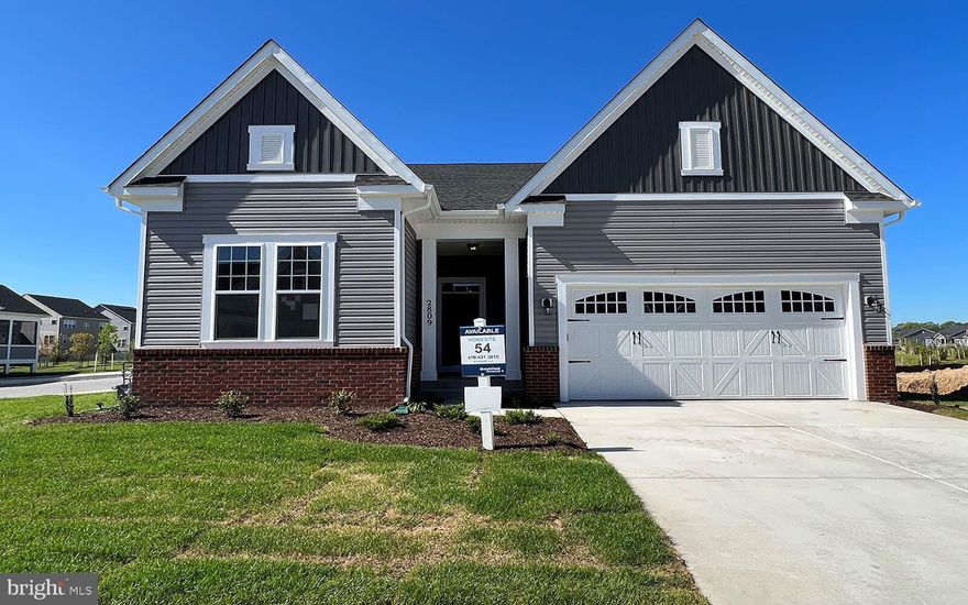 Brand New Home Ready for Move In! This Monet II is located on a corner homesites, just a few minutes walk from the community clubhouse, pool and other amenities!
The exterior of this beautiful home boasts a brick front water table and a 2-car garage with an upgraded door.  The Main Level with 10' Ceilings, offers 3 Bedrooms, 2 Bathrooms and the convenience of a laundry room. The open concept floorplan has hardwood floors in the the kitchen flowing into the dining room and family room where additional windows were added for extra light.  The kitchen itself is a chef's dream with Gourmet Stainless Steel Appliances, Cararra Morro quartz countertops and white cabinets. Located off the great room is a rear screened porch, to enjoy outdoor living and entertaining year-round.
The spacious primary suite is tucked in the rear of the home on the main level and features two large walk-in closets and added windows for extra sunlight! The primary bathroom has a frameless shower and quartz countertops. 
The walk up lower level has a finished recreation room, 4th bedroom and a full bathroom perfect for hosting guests.
Plus, with buying new, you get the peace of mind of a 10 year builder warranty! 
Two Rivers 55+ located in Odenton, Maryland provides main-level living in a tight-knit and welcoming community for you and your family. Every day will be a vacation at Two Rivers with amazing amenities like walking trails, indoor and outdoor pools, and so much more.