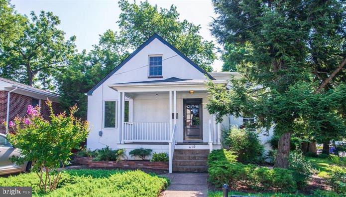 Charming 3BR, 2.5BA Single Family home on a rare double corner lot in great Arlington location! Inviting front porch welcomes you as you enter into main level featuring neutral paint tones, crown molding hardwood floors, arched walkways & ample sunlight throughout the many windows*Bright & open living room leads to dining area*Updated kitchen with ample cabinetry, butcher counters & stainless steel appliances*Open shelving perfect for pantry with patio door leading to backyard*Two bedrooms plus full bathroom & powder room also on main level*Hardwoods throughout upper level features primary bedroom with bonus space perfect for office with two sets of sliding glass doors & second full bathroom*Fully Finished basement features recessed lighting, neutral paint tones, LVP floors a large rec room + storage & laundry*Enjoy back patio + a lushly landscaped, large level lot with lawncare included in rent*Stellar commuters location by rt 50 & I-395 for easy access to the Pentagon & DC*Within walking distance to Columbia Pike for WMATA Bus 16E to downtown DC, close to Ballston, restaurants, shopping, grocery stores, schools, & entertainment*Close commutes to Ft. Myer, FSI, Pentagon, DC by bus or car*