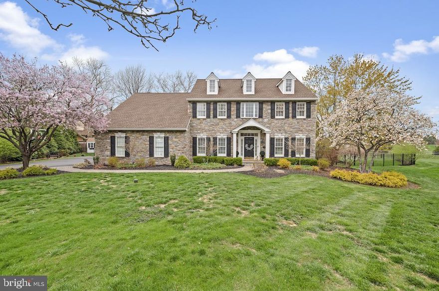 OFFER DEADLINE MONDAY 5/12 BY 5:00PM! Tucked away on a serene, private cul-de-sac in the heart of Blue Bell, 13 Norristown Road offers a rare blend of refined elegance and modern comfort. This stately, fully fenced, 4-bedroom, 2.5-bathroom residence spans 3,192 square feet and is situated on a meticulously landscaped 0.72-acre lot. As you approach via the private lane of Glenmore Manor, consisting of four luxury properties, the home’s impressive stone façade - resulting from a comprehensive stucco-to-stone veneer and Hardie Board renovation completed between 2017 and 2018 - immediately captures attention. (Correction - Not an HOA! The neighbors share an insurance policy for the road for $212.00 a year and then share a lawn company for $71/week). Inside, a grand two-story foyer welcomes you with gleaming hardwood floors and intricate custom molding. To the left, French doors open into a cozy study adorned with custom built-ins, providing an ideal space for work or reflection. To the right, the formal living room offers a serene setting for reading or musical pursuits. The sophisticated dining room, featuring elegant wainscoting and a tray ceiling, seamlessly connects to the gourmet custom kitchen. This culinary haven boasts custom cabinetry, granite countertops, and top-of-the-line stainless steel appliances, including a Viking stovetop, Bosch oven, wine refrigerator, and a built-in refrigerator/freezer combo. A spacious center island and walk-in pantry cater to both everyday living and entertaining. Adjacent to the kitchen, the breakfast room door opens to the EP Henry paver patio, perfect for outdoor dining. The open-concept design flows into a generous family room, highlighted by a vaulted ceiling and a striking stone fireplace, creating a warm and inviting atmosphere. Additional first-floor amenities include a laundry room, built-in cubbies, a half bath, and access to the attached two-car garage. Upstairs, the expansive primary suite serves as a private sanctuary, featuring two walk-in closets with custom built-ins and a luxurious en-suite bathroom. This spa-like space includes an oversized soaking tub, a tiled stall shower with glass doors, and a private toilet area. Three additional well-appointed bedrooms and a full bathroom complete the upper level. The finished basement offers ample space for entertainment, fitness, or relaxation, along with abundant storage in the unfinished section. Step outside to a beautifully landscaped backyard, where the upgraded greenery and flat terrain provide a tranquil setting for outdoor activities or quiet reflection. The EP Henry paver patio serves as an ideal spot for gatherings or enjoying the serene surroundings. Additional features include a full-house natural gas generator, ensuring uninterrupted comfort and many recent upgrades, such as new roof, HVAC, water heater, windows, gutters, 240V outlet for electric car charging and much more (list attached!). Located within the award-winning Wissahickon School District and offering convenient access to public transportation and major highways, this home perfectly balances luxury, functionality, and location.