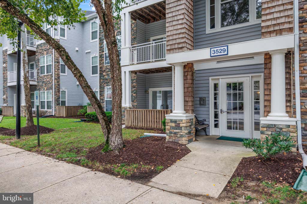Photo of 3529 Piney Woods Place #I101, LAUREL, MD 20724 (MLS # MDAA2154958)
