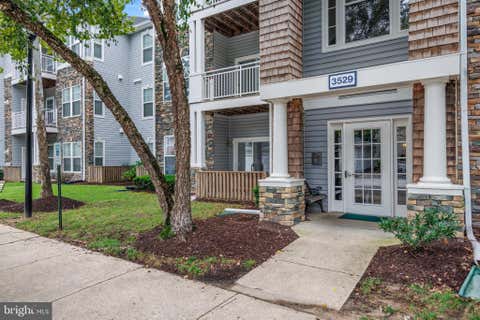 Photo of 3529 Piney Woods Place #I101, LAUREL, MD 20724 (MLS # MDAA2154958)