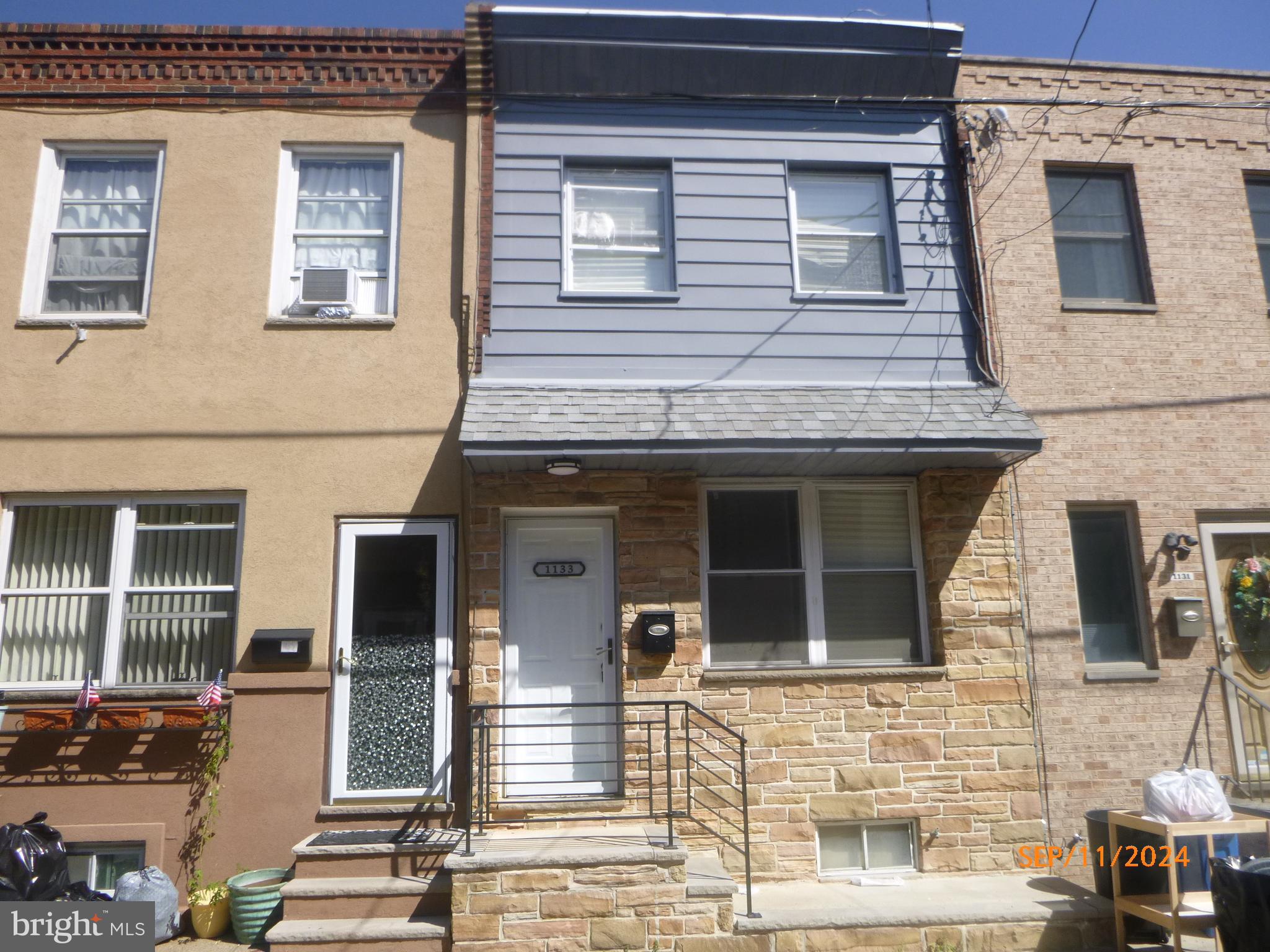 This modern 3 bedroom row home is completely renovated and ready for move-in! Includes a powder room on the first floor and a finished basement for more living space. Beautiful kitchen and bathrooms, newer flooring throughout plus a refrigerator, dishwasher & microwave (as-is condition). Desirable East Passyunk Crossing location. Must see to appreciate. Easy to show, on lockbox. Make an offer today, won't last long.