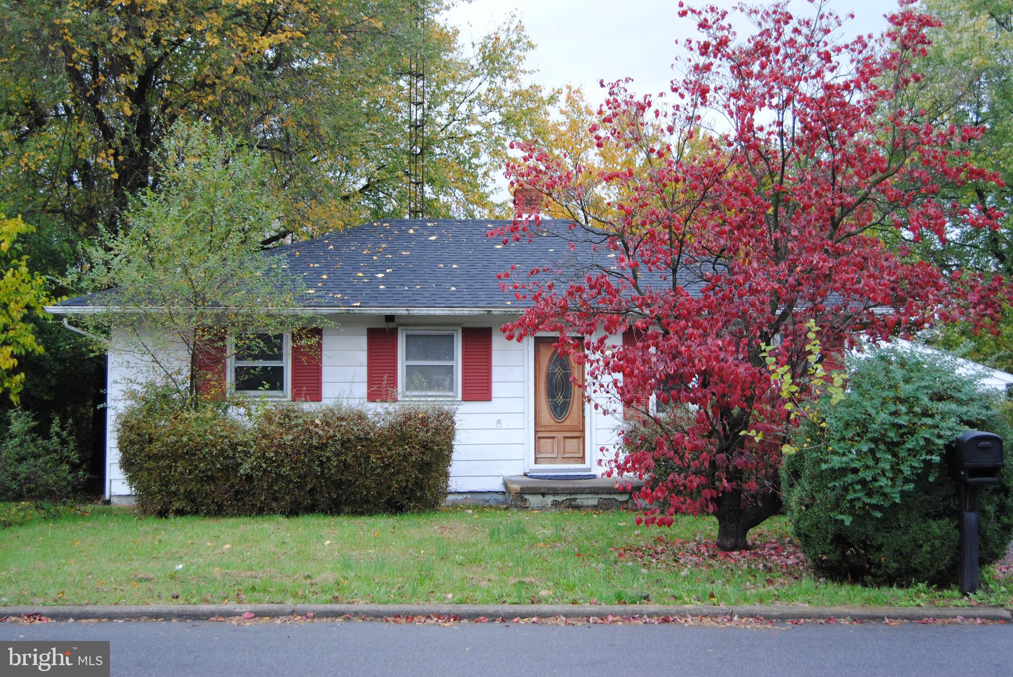 3 BR, 1 Bath home with hardwood floors, garage, covered back porch and nice yard