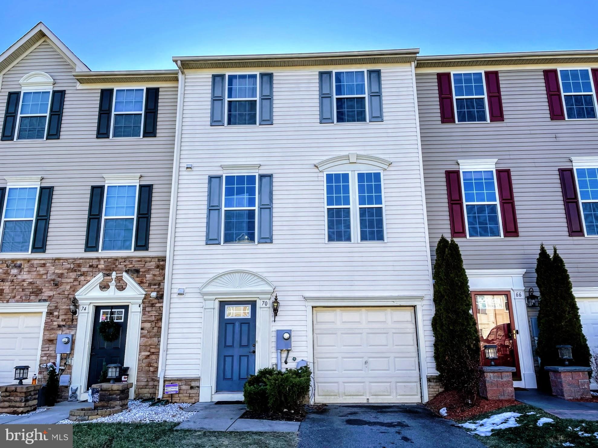 Stunning 3-level townhome available for lease in the esteemed Brookfield community of Falling Waters. Offering quick access to I-81 and convenient proximity to Hagerstown and Martinsburg, this residence provides ample space to accommodate your needs, boasting 3-4 bedrooms, 2 full baths, and 2 half baths. The lower level comprises a one-car garage, powder room, and expansive recreational room that could easily serve as a fourth bedroom, leading to a backyard area. The main level presents an additional half bath, an open-floorplan living room, kitchen, and dining area. Ascending to the upper level, you will find 3 bedrooms and 2 baths, including a primary bedroom with an en suite bathroom, as well as a laundry room equipped with a utility sink. Pets will be considered on a case-by-case basis.