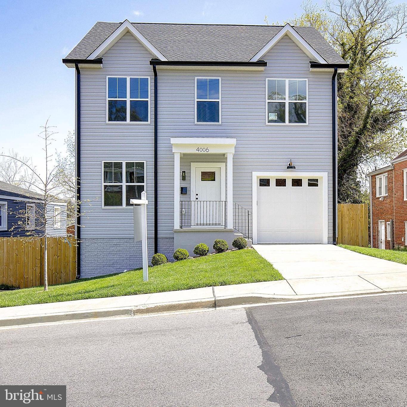 Welcome home to 4006 Alton Ave! This newly built home offers 5 bedrooms and 3.5 full baths. Inside you will find three fully finished levels, all thoughtfully designed with modern details, custom accents and upgraded finishes. Upon entering the home, a cozy family living area welcomes you before opening up to the large combination kitchen and dining areas. Enjoy plenty of natural light in the kitchen with the large windows and sliding glass door that provides views of large fenced in rear yard. This well-equipped kitchen offers stainless steel appliances, an expanded peninsula island, premium quartz countertops, and craftsman style cabinets. You will also find a conveniently located half bath on the main living floor.
As you navigate the upper level a large primary suite toward the front of the home provides a spacious bedroom with a trim accented wall, a generous closet, and primary bath that offers a double sink vanity and a fully tiled and glass enclosed shower. The upper level also showcases three additional bedrooms, and a second full bathroom complete with a tiled tub/shower combo.
Finally, on the lower level, you will find a cozy family area, sizable laundry room, and additional bedroom. For convenience and ease, a third full bathroom is included on the lower level, making it the perfect floor for overnight guests, family lounging and casual entertaining.
Capitol Heights is just a short distance from Washington D.C., and this location is within walking distance to numerous public transportation stops that easily transport you to work and/or all of the action of the while still providing that residential feel. A few short blocks away you will find additional amenities offered at the Oakcrest Community Center, which include basketball courts, a weight room, multi-purpose sports fields, and tennis courts.