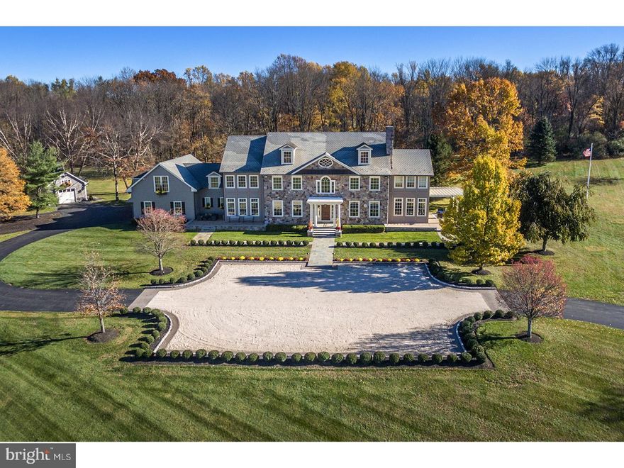 One of the rarest and most precious properties in Solebury Township, Crosscreek Farm is an extremely private, gated estate on 92.78 sprawling acres in the heart of the esteemed Aquetong Valley. Travel the gently winding drive to this completely redefined manor house with stunning long-distance views, a visual treat in every season. The center-hall floor plan is awash in sunlight through its tall windows and every room is trimmed in substantial, custom millwork. A striking butterfly staircase is the focal point of the foyer. Gracious formal rooms and family living spaces are sized for entertaining with an all-new kitchen ready for everyday and special occasions. Outfitted with timeless white cabinetry, granite counter tops and a full complement of commercial-grade appliances, it features two islands with bar seating ? a fun party space, to be sure. Enjoy pristine country views from the breakfast room, or opt for al fresco dining on the patio just outside the kitchen's French doors. A richly paneled study with built-ins, conservatory with access to a brick terrace with pergola and laundry/utility areas complete the first floor. Private quarters include a main bedroom suite with fireplace, walk-in closet/dressing room and sumptuous marble bath with soaking tub and oversized frameless glass shower. There are five additional bedrooms, all served by newly refurbished bathrooms. An expansive suite has just been created over the garage and is a beautiful retreat for in-laws, au pairs or long-term guests to call home. Also newly complete is the lower-level entertainment area with new flooring, wet bar, media room with projection system, game/lounge area and full bath. For warm-weather relaxation, a reinvented, heated, in-ground pool awaits with a new slate surround and a raised lounge area with waterfall. A four-bay garage provides ample storage for cars and equipment ? there's plenty of suitable land should you wish to get on a tractor and be an executive farmer. As a retreat, as a gentleman's farm or as a family residence, Cross Creek Farm is one of the most exceptional properties now available in Bucks County. Under Act 319, no further subdivision.