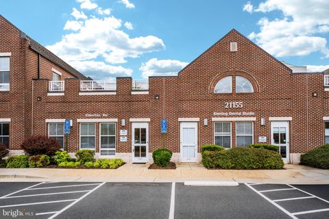 Photo of 21155 Whitfield Place #103, STERLING, VA 20165 (MLS # VALO2125606)