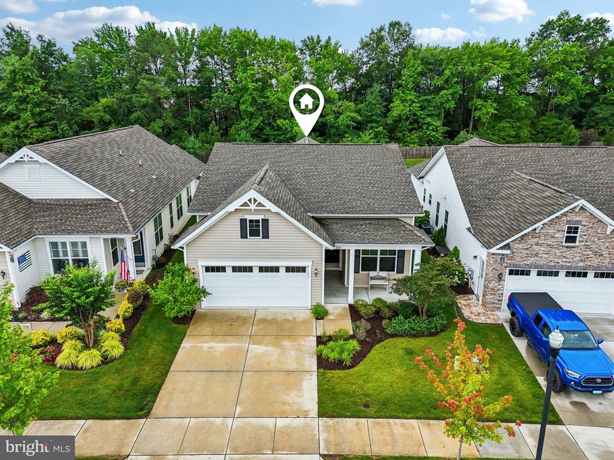 Welcome to Easy Living on the Eastern Shore! 
***
Discover the perfect blend of comfort, style, and resort-style living in this impeccably maintained, one-owner home — tucked into the highly sought-after, water-privileged 55+ community of Four Seasons at Kent Island.
From the moment you walk in, you’ll notice the difference. The open-concept floor plan is thoughtfully designed and beautifully upgraded with custom finishes and designer lighting, setting the stage for elegant everyday living.
***
At the heart of the home is a show-stopping kitchen—featuring a dramatic black quartz island, crisp white shaker-style cabinets, and ample prep space for casual meals or gourmet entertaining. The kitchen flows effortlessly into a warm and inviting family room anchored by a gas fireplace—perfect for cozy evenings or lively conversations.
***
Need a little flex space? You’ve got it. A versatile bonus room makes the ideal office, craft room, guest space, or private retreat, bathed in natural light. Step out onto the custom-stamped concrete patio where you can sip morning coffee, host a happy hour, or just kick back and enjoy the quiet, watching the birds at the pond or the treelined backyard. 
***
But the real magic? The lifestyle.
***
Four Seasons at Kent Island offers unmatched amenities that feel more like a vacation than a neighborhood. Think:
***
 - A stunning 24,000+ sq ft clubhouse
.
- Indoor and outdoor pools
.
- A waterfront pier with boat slips for visiting friends
.
- Fitness center, game room, chef’s kitchen, meeting spaces
.
- A full-time lifestyle director curating events, live music, and clubs
.
- All of this—just 20 minutes from Annapolis and right off Route 50 for easy getaways or guest visits.
.
- Low-maintenance, high-style, and built for enjoying every chapter of life to the fullest.
.
See why so many are choosing Four Seasons at Kent Island—and why this Donegal model might just be the one you’ve been looking for.