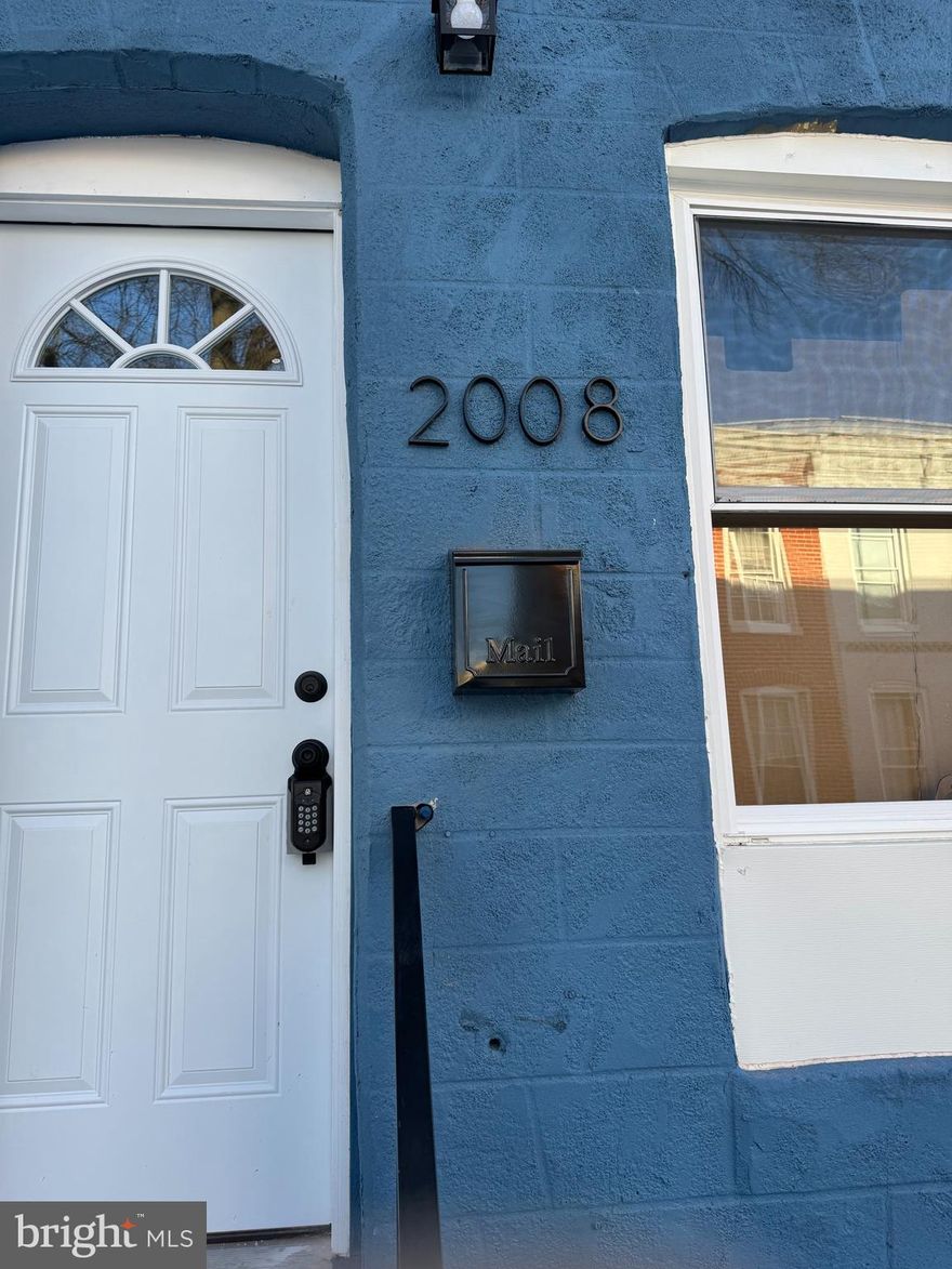 Turnkey opportunity with built-in income potential. This fully renovated end-unit 3-bedroom, 3-bath property features a highly desirable layout — each bedroom includes its own private full bathroom, making it ideal for co-living, room-by-room rental, student housing, or house-hacking strategies. Move-in ready with modern finishes throughout and basement laundry for added tenant convenience. The fully fenced rear concrete yard offers low-maintenance outdoor space. Green space and a playground directly across the street enhance rental desirability. Strategically located near Coppin State University, University of Baltimore, MICA, and the University of Maryland Medical Campus, with easy access to public transportation including Metro, Light Rail, commuter rail, and bus routes — key factors for consistent tenant demand. $95,000 in potential grant funds available for qualified buyers, plus additional lender incentives, which may reduce cash-to-close for owner-occupants utilizing a house-hack approach.