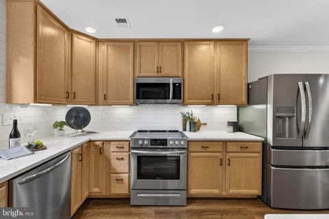 Photo of 1978 Winterport Cluster, RESTON, VA 20191 (MLS # VAFX2305498)