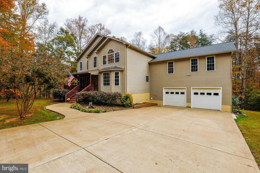 HUGE PRICE DROP! 6 Bed home Nestled into 3+ ACRES w/ Full APARTMENT. ! This rare find HAS TONS OF ROOM, over 5800 square feet of living space,  HUGE kitchen with double wall ovens & island with cooktop, family room with stone fireplace, MBR w/ his & hers walk-in closets/fireplace/double vanities, & apartment complete with bedroom, kitchen & bath with separate entrance. Fully finished basement!