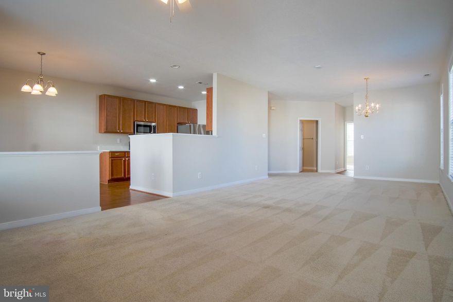 Some homes just feel right the moment you walk in. This one checks all the boxes.
Tucked on a corner lot in the sought-after Legacy Woods community, this well-loved ranch-style home has been freshly painted throughout and is truly move-in ready. The open floor plan makes everyday living easy. The kitchen, living, and dining areas all flow together naturally, whether that's a Tuesday night dinner or a laid-back weekend with friends over.
The kitchen got a real upgrade: brand new stainless steel stove, built-in microwave, and dishwasher, plus a nearly new refrigerator. Beautiful white quartz countertops, recessed lighting, and a cozy gas fireplace make the space feel elevated without being fussy. The primary bedroom is roomy with a walk-in closet, and the second bedroom and two full baths give you the flexibility you need for guests, a home office, or whatever life calls for.
Outside, the corner lot gives you breathing room, and the community takes care of the heavy lifting with lawn maintenance and snow removal included. When you want to get out, the neighborhood pool and clubhouse are right there waiting.
Legacy Woods is a low-maintenance lifestyle in a great location. You're minutes from everything Fredericksburg has to offer, with easy access to I-95 for the commute. It's the kind of place where you can actually slow down and enjoy where you live.
Come see it in person.