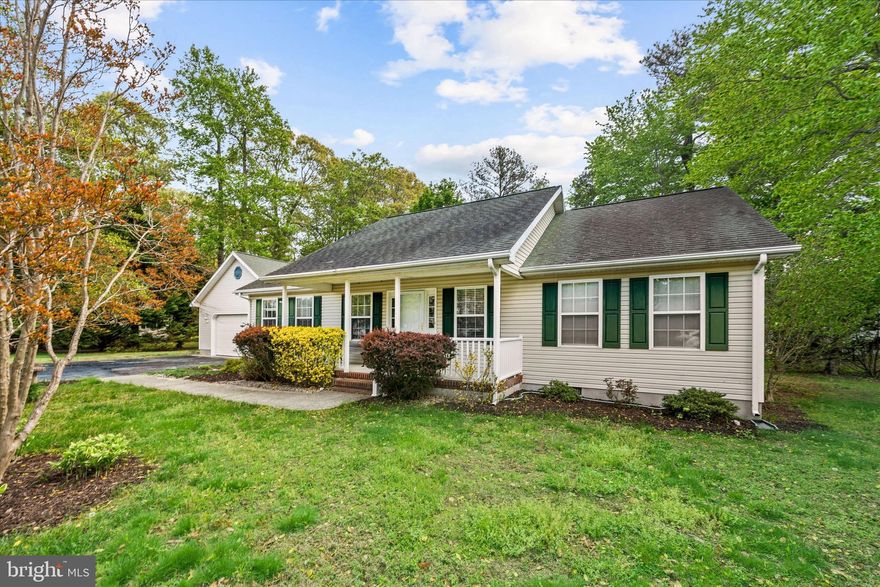 Welcome to 33873 North Hebron Drive, a beautifully maintained 3-bedroom, 2-bath home offering one floor living of comfortable space on a generous half-acre lot in The Cove on Herring Creek. Perfectly located just minutes from the heart of Rehoboth Beach, this property combines relaxed coastal living with the privacy and space of a suburban retreat.

Step inside to discover an inviting open floor plan filled with natural light. The spacious living area features warm finishes and a comfortable flow, ideal for both entertaining and everyday living. Travel to the back of the home and enjoy a relaxing additional living area with wood fireplace perfect for cold evenings and  access to a deck in warm weather and a large screened in porch for summer dining or morning coffee.
The kitchen offers ample cabinetry and counter space, opening to a bright dining area perfect for gatherings with family and friends.

The primary suite provides a peaceful escape, complete with a private bath and large closet. Two additional bedrooms and a full bath ensure plenty of space for guests or a home office.

Outdoors, enjoy the serenity of your .5-acre lot, with plenty of room for gardening, recreation or relaxing after a day at the beach. The property’s location provides easy access to local beaches, shopping, dining, and the best of Delaware’s coastal lifestyle — all while being tucked away in a quiet, established neighborhood.
This wonderful community offers a community pool and access to a dock for fishing, canoeing or kayaking.
Welcome to Coastal living!

Property is being sold "as is", furniture and furnishing are included.