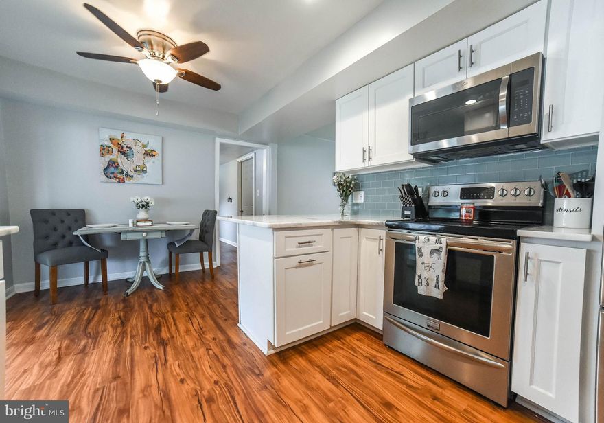 Home Sweet Home! Prepare to fall in love w/ this spacious 4BR 2BA Cape Cod! Updated kitchen w/granite counters,SS appliances, & back splash. Large living perfect for entertaining. Features 2BR on upper level, 2BR on main level & separate laundry room. Slider off kitchen will take you to screened in porch overlooking level, fenced in backyard. Easy access to route 50 & shopping/restaurants. No HOA!