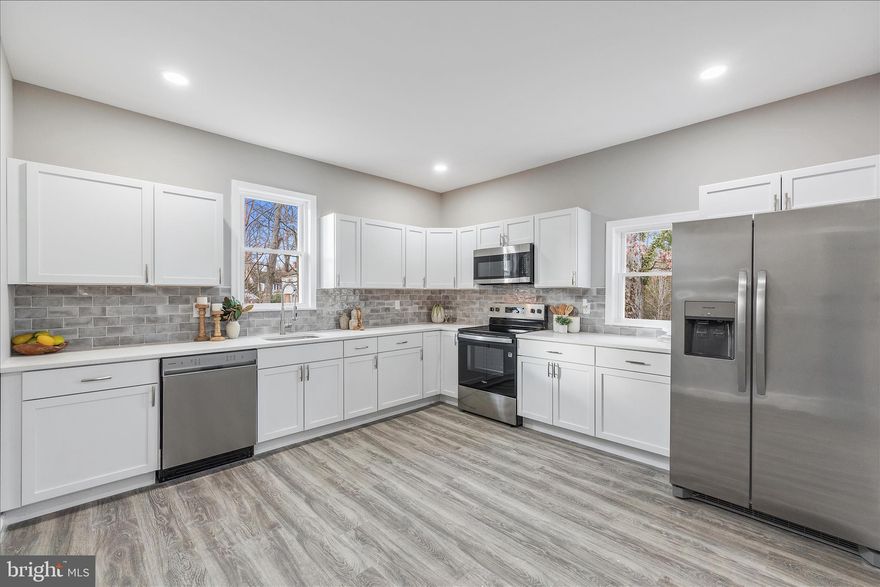 Come and see this gorgeous 2 Level home showcasing 4  bedrooms and 3 full bathrooms with  a spacious  basement and attached single auto garage, in a highly desirable neighborhood. The updated interior showcases contemporary finishes and a thoughtful layout that maximizes both style and functionality. Complete with open floor plan and modern finishes that will wow you the minute you walk through the door. The bathrooms have been tastefully refreshed adding modern elegance to this classic home. Freshly painted and new carpet, flooring throughout. The custom kitchen with quartz countertops, and stainless-steel appliances offers maximum versatility and functionality. Walk out the lower-level for the outdoor retreat area, great for grilling or simply enjoying the outdoors..   Keep your autos clean and dry in the Detached garage. Close to restaurants and shopping adding convenience to major routes, restaurants, and entertainment. Schedule to see this amazing home today!!