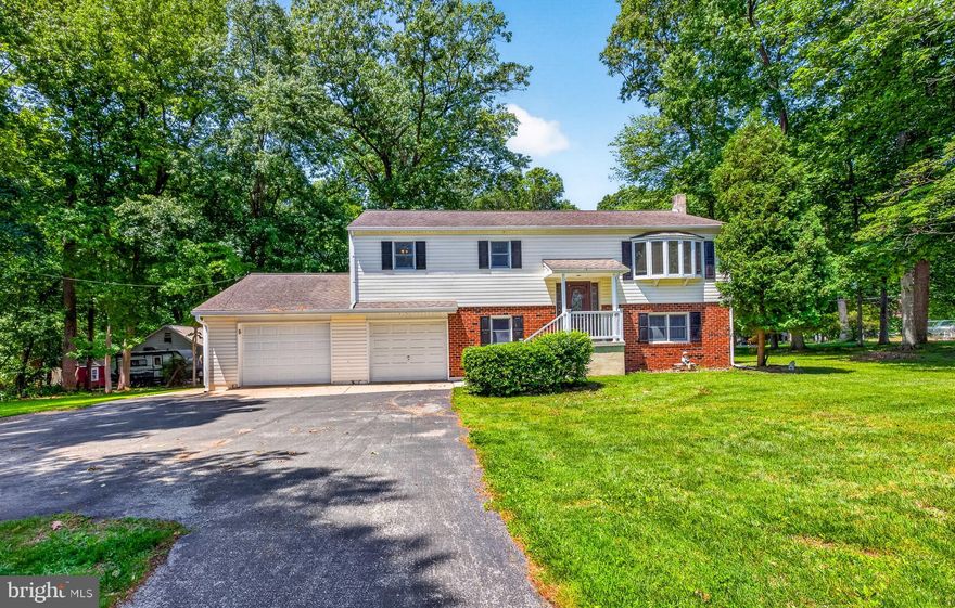 Welcome to 3701 Ebright Road located in the sought after Garnet Valley School District!  This spacious 4 bedroom, 2.5 bath split level home sits on a large, partially wooded 0.98 acre lot adjacent to Jack King Park.  Entering through the front door proceed upstairs to the bright living room.  Across the rear of the home is the large kitchen and dining room with sliding glass door to a large rear deck.  Down the hallway is the primary bedroom with en-suite, 2 additional bedrooms and full bath.  Downstairs is a large family room with wood burning stove and sliding glass door to rear patio.  An additional bedroom, powder room and laundry-utility room complete this floor.  The utility room leads to the two individual one car garages.  This awesome home and property is waiting for someone to start their next chapter.  Home is being sold in as is condition.  Any inspections would be for informational purposes only.  Homes