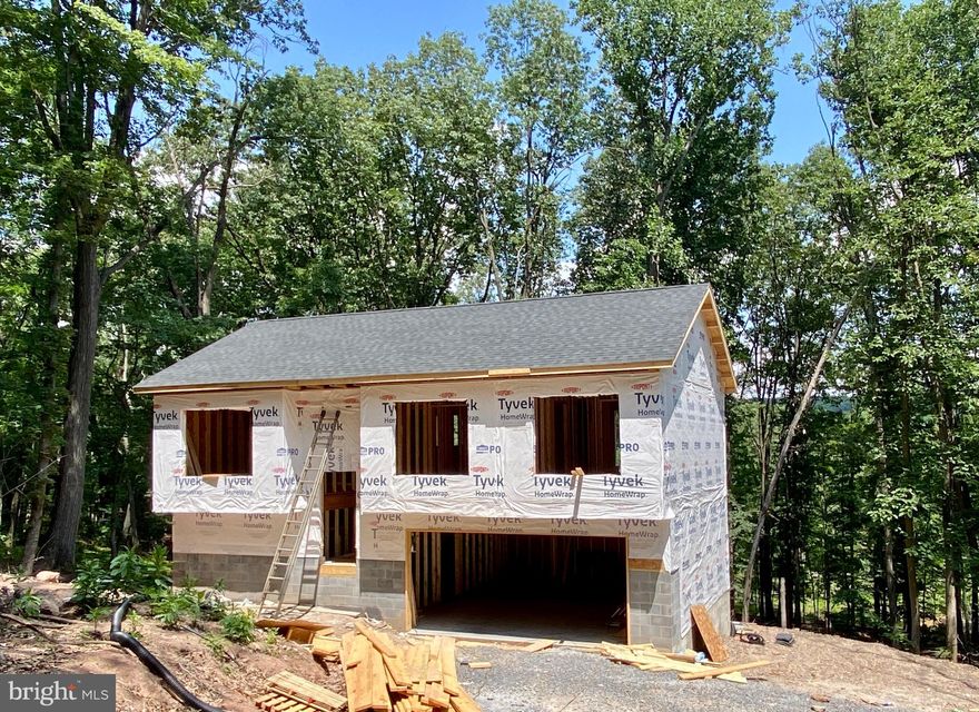 TO BE BUILT! Currently under construction, this home is sitting on 1.34 wooded acres in the private Sleepy Hollow Community. Where else are you able to come home from work and sit down on your kayak as you launch onto the community lake?
The Wexford Model features 1,381 sq. ft. of living space on two levels. The main level offers a living room, dining room, kitchen, two baths and three bedrooms. The lower level with a two-car garage a large family
room and a half bath with utility and storage area. Recreation abounds with private lake, Cherry Run, ball field and picnic area. Call today to start the discussion!