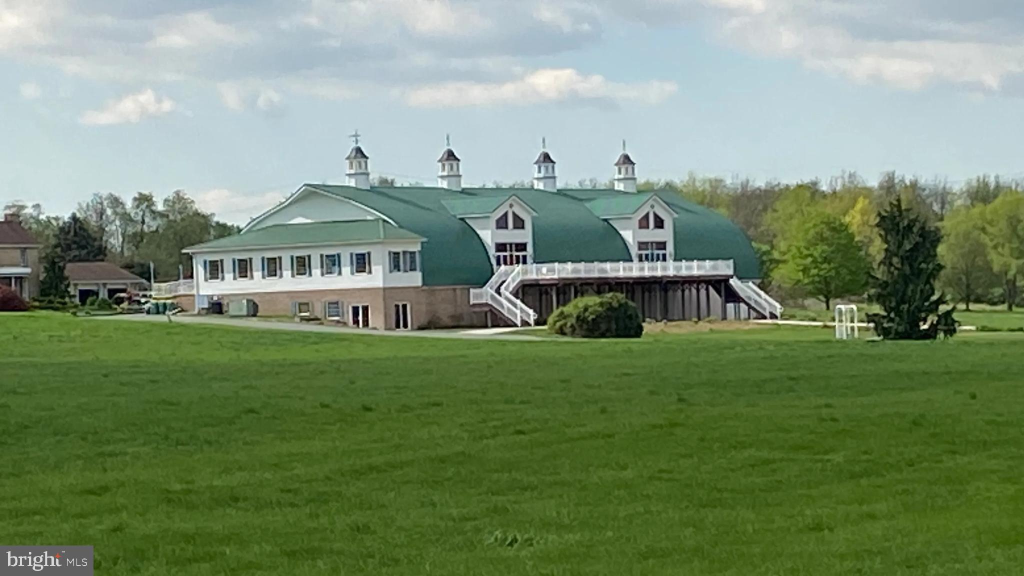 Located in the countryside of Southcentral Pennsylvania, Green Grove Gardens is a premier event center for fully-catered weddings, fundraisers, auctions, concerts, meetings, parties, craft shows and more. A renovated dairy barn accommodates up to 600 guests seated and is permitted to hold 1000 people, and 40 acres of beautifully landscaped gardens are ideal for outdoor ceremonies.
Green Grove Gardens began as a working dairy farm, owned by the Martin family. Recognizing the beauty of the property, the Martins began hosting weddings for friends and family in the local community. Over the years, they transformed the space with lush gardens and serene water features.
The iconic old dairy barn soon became the perfect venue for a wedding reception, the barn was renovated into a stunning event hall. The original hardwood floors were preserved, adding timeless warmth to the space. A spacious deck was added, offering breathtaking views of the Tuscarora Mountains, while the surrounding 40 acres were further landscaped with fountains, a pergola, and winding walkways.
Included in the sale are a large 4 bedroom farm house (rented), garage, all equipment, vender list, marketing page, event contracts, website, event hall, 2 acres of parking lot, and much more. Call today to schedule your private tour.
BUYERS MUST BE PRE APPROVED FOR PURCHASE PRIOR TO SHOWING OR HAVE PROOF OF FUNDS.