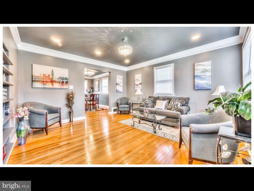 Exquisite Top to Bottom Fully renovated 4 BR, 2 Full Bath home in 21239. Open floor Plan with over 1800 square ft. Gorgeous kitchen with abundance of cabinets as well as large panty for your entertaining. Kitchen features large island with bar overhang, stainless steel appliance, granite countertops. Beautiful hardwood flooring , crown molding as well as LED Recessed lights, W/W carpet, ceramic tile bathrooms, new windows and much more. For that added storage space there is a walk up attic awaiting your creative use as needed. The Lower level is fully finished with W/W carpet as well as a 4th BR and full bath. Enjoy the outdoors with the private patio area in the oversized rear yard perfect for entertaining and enjoyment. The property is located on a corner lot with parking available on multiple sides.