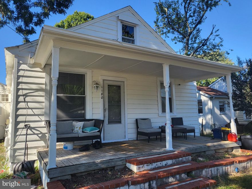 Semi-detached residence of 2 homes on over 1/2 acre offers several unique opportunities -  live in 1 house and rent the other, rent both homes (#1180 rent $1200 & #1182 rent $850 - both monthly), combine 2 houses - as well as extend the footprint onto 1/2 acre lot, tear down the structure and build new modern home. Built in 1942, 2 structures total 1,364 finished square feet. Both homes are open floor plans with front porches. (Details under rooms is total for both buildings.) Building #1182 is open LR - Kit with wood floors in living room area, 2 BRs have carpet, combo washer/dryer (new Sept 2025). Building #1180 includes table space kitchen with 2 windows, all essential appliances, including dishwasher, spacious sunny (windows on 2 sides) living room - dining room with carpeting, 2 Bedrooms plus attic with windows. Long level backyard offers privacy, gardening and space for outdoor activities, plus storage shed. Located close to all Eastport and downtown Annapolis amenities - marinas, restaurants, parks and pubs, as well as easy access to major highways. Note that legal lot number for both builidngs is #1182, but each building using its own number for convenience.