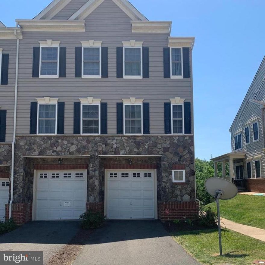 THIS PLACE IS GORGEOUS!!  BEAUTIFUL NEW ENGINEERED FLOORING - FRESH PAINT - NEW CARPET - LARGE KITCHEN WITH GRANITE - STAINLESS STEEL APPLIANCES - BACKSPLASH - EAT IN KITCHEN - SEPARATE DINING ROOM - SEPARATE LIVING ROOM - 3 SPACIOUS BEDROOMS AND 2 FULL BATHS UPSTAIRS TO INCLUDE MASTER BEDROOM WITH EN SUITE LUXURY BATH - FINISHED BASEMENT WITH REC ROOM - 2ND REFRIGERATOR - TONS OF STORAGE SPACE - WALK OUT - VERY CONVENIENT TO MAJOR HIGHWAYS - QUANTICO - VRE - COMMUTER OPTIONS AND COMMUTER LOTS - SCHOOLS - SHOPPING - RESTAURANTS - PARKS AND MORE!!  650+ CREDIT SCORE - INCOME TO BE 3 TIMES THE MONTHLY RENT AMOUNT - CURRENT RENTAL WITH NO LATE PAYMENTS AND A CLEAR BACKGROUND CHECK - PETS ACCEPTED ON A CASE BY CASE BASIS - BREED RESTRICTIONS - NO MORE THAN 2 PETS - PETS NOT TO BE MORE THAN 30 LBS -  IN ADDITION TO THE BASE RENTAL RATE, TENANT WILL BE RESPONSIBLE FOR PAYING A $13.00 CHARGE THAT WILL BE USED TO HAVE HVAC FILTERS DELIVERED TO THEIR HOME APPROXIMATELY EVERY 60 DAYS UNDER THE UTILITY AND MAINTENANCE REDUCTION PROGRAM TO HELP SAVE 5-15% OF THE HEATING AND COOLING BILL AS WELL AS CREATE A CLEAN ENVIRONMENT.