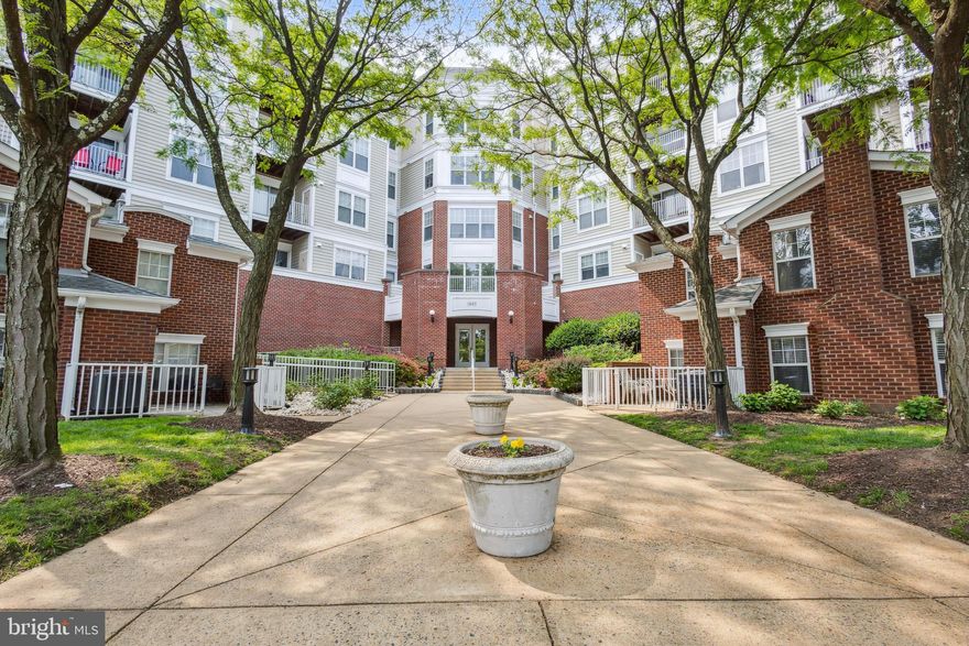 Nestled in the heart of Tysons, Virginia, this rare and stunning fourth-floor, two-level Jonathan Model condominium at Lillian Court offers an exceptional blend of comfort, convenience, and modern elegance. Sunlight fills this beautifully updated two-bedroom, two-bath home, highlighting the brand-new flooring and the inviting gas fireplace in the living room. Step outside to a cozy private patio, perfect for relaxing or entertaining.  

The upgraded kitchen boasts sleek stainless steel appliances, while the in-unit stacked washer and dryer add an extra touch of convenience. Both spacious bedrooms feature generous walk-in closets, with direct access to the patio for an effortless indoor-outdoor living experience. This unit also includes a coveted garage parking space (G70) located right next to the elevator for easy access.  

Lillian Court offers an array of resort-style amenities, including a swimming pool, private gym, sauna, and an elegant clubroom with soaring double-height ceilings. This pet-friendly community places you directly across the street from Tysons Galleria, offering world-class shopping, fine dining, movie theaters, and entertainment just steps away. Enjoy the vibrancy of The Boro, nearby walking trails, and the unparalleled convenience of being less than a mile from the Tysons and McLean Metro stations. With major commuter routes like I-495, I-66, Route 267, and Leesburg Pike just minutes away, this home provides seamless access to the best of Northern Virginia and beyond.  

Experience urban sophistication with the warmth of garden-style living—schedule your tour today!