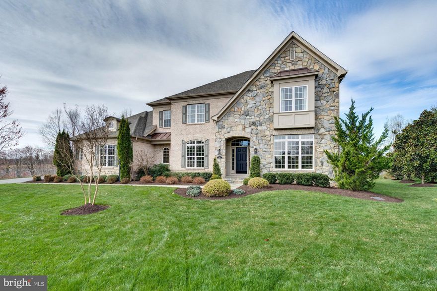 Exquisite Willow Oaks home sited on a premium 0.83 acre corner lot! This meticulously maintained home boasts 4 bedrooms, 4 full and 2 half bathrooms and 5,898 sq ft over 3 levels. A grand hardwood foyer welcomes you with arched entryways leading into the living room, which features a fireplace, a dining room, and a butler's pantry, creating a perfect flow for entertaining. The chef's kitchen features a fireplace, breakfast bar island and top-of-the-line stainless steel appliances, including a professional range. Additionally, this level boasts a cozy family room with a gas fireplace, a home office, a mudroom, and a half bathroom. Upstairs, the primary suite offers a sitting area, dual walk-in closets, and a luxurious spa-like bath with a glass enclosed shower and separate soaking tub. Three more spacious bedrooms each come with their own full bathrooms. The expansive walk-up lower level boasts a recreation room, a wet bar with a wine fridge – perfect for movie nights or game days. This level also features a half bathroom, a massive storage space, and a rough-in for a full bath. Beyond the stunning interior, this expansive property boasts a private backyard oasis. Enjoy the patio, or unwind in the gazebo, complete with a fireplace for year-round enjoyment and an outdoor kitchen. Located in Oakton, this property is close to shops, restaurants, and falls within the top-rated Oakton pyramid.