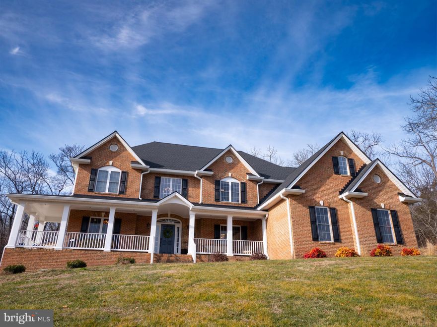 STUNNING HOME WITH ACREAGE! Imagine having nearly 5,000 square feet of finished living space on two acres with no HOA - just 20 minutes from downtown Winchester!! This house is special - and you'll feel it as soon as you see it! 161 Skylar Lanes Way has been lovingly maintained, updated, and renovated. Absolutely no detail has been overlooked over the past few years!! This home features SIX bedrooms and FIVE full baths. Upstairs, the luxurious primary bedroom will make you feel dreamy in no time with its brand-new en-suite remodel. For ultimate convenience, another bedroom has an en-suite upstairs, too, and two more bedrooms share a Jack-n-Jill bath. On the main level, another bedroom next to a full bath offers tons of possibilities for family or guests. A gorgeous den is ready for your work or play, and the two-story family room offers plenty of natural light, built-ins, and an electric fireplace. Want some shade? There are three solar-powered blinds on the top family room windows; they are remote-controlled and can be closed within seconds. The kitchen was recently updated with quartz countertops, some custom cabinetry, and more, and a new marble tile backsplash is currently being installed. You will love the breakfast nook, too, and there is a covered patio area close to the kitchen that is great for barbecues and entertaining.  Butler's pantry? Check. Regular pantry? Check. Downstairs, a huge rec room awaits. There is also a bedroom, several bonus rooms, and another full bath. One bonus room is soundproofed and includes a Bose home theatre system! The amenities keep coming outside, as well!! The brand-new architectural shingle roof contains copper granules to prevent streaking and moss growth. There are new 5" gutters, extensive landscaping, outdoor lighting, a large composite deck, and front garden beds with irrigation. Need extra storage? The attached three-car garage will help. If you need more, there are TWO sheds. One is great for your mowers, while the other serves as a fantastic workshop complete with electricity, a window air conditioning unit, work benches, and slatwalls. The upgrades and updates don't stop there! Please refer to the attached documents for more information. Note: the zero-turn mower, snow blower, push mower, alarm system, and more convey! This is the upscale country retreat you've been waiting for!! Schedule your showing today.