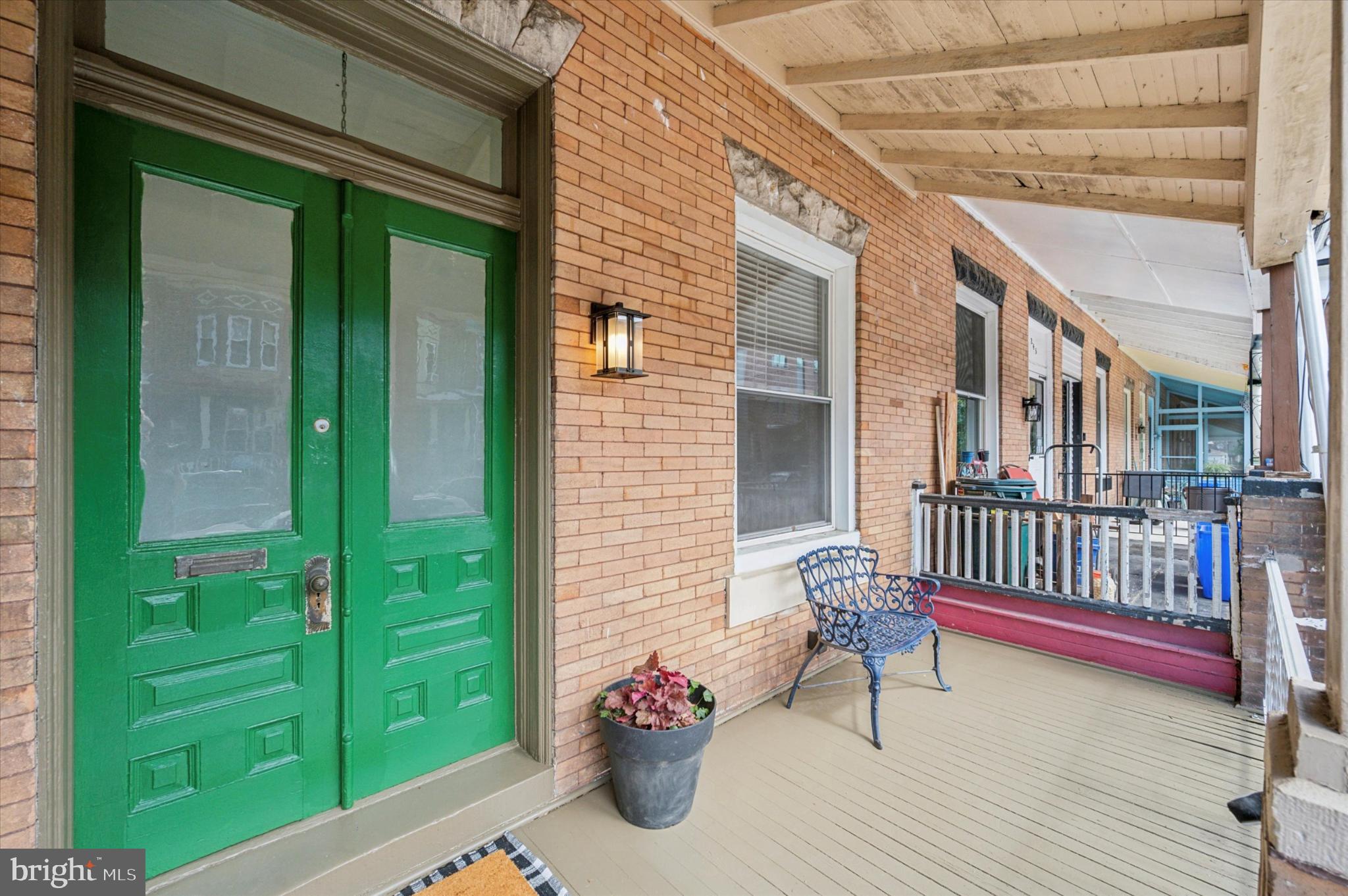 ***Seller is requesting highest and best offers by Monday, August 18 at 3:00 pm*** Timeless charm meets vibrant location at 247 W. Haines. Set on a friendly street where neighbors gather for block parties and look out for one another, this West Germantown gem offers character, convenience, and community.
Step inside through the vestibule framed by original glass doors, and you’re welcomed by restored hardwood floors, vintage door hardware, and a stunning Victorian tile fireplace with ornate iron grate. The spacious living room opens into a large dining room that’s perfect for gathering with friends and family. From there, you’ll find a cozy kitchen that’s equipped with new appliances and ready for your dream renovation. Just beyond, a mudroom with laundry and a new half bath keeps everyday living convenient and organized. The back door leads you outside to a shady, fenced patio that’s ideal for summer barbecues, cozy fall evenings, or morning coffee in your own private retreat.
Upstairs, restored hardwood floors continue throughout three well-sized bedrooms. A full hall bath with claw foot tub and shower completes the second floor. The large, dry basement has high ceilings for additional storage or potential finishing. While the home retains its original character, recent upgrades include a new roof (3/2025), and new electric with 200 amp service (2019). Conveniently located you’ll enjoy easy access to the shopping, dining, and green spaces Germantown has to offer, plus the Chelten Station just around the corner for a quick 25-minute ride to Center City.