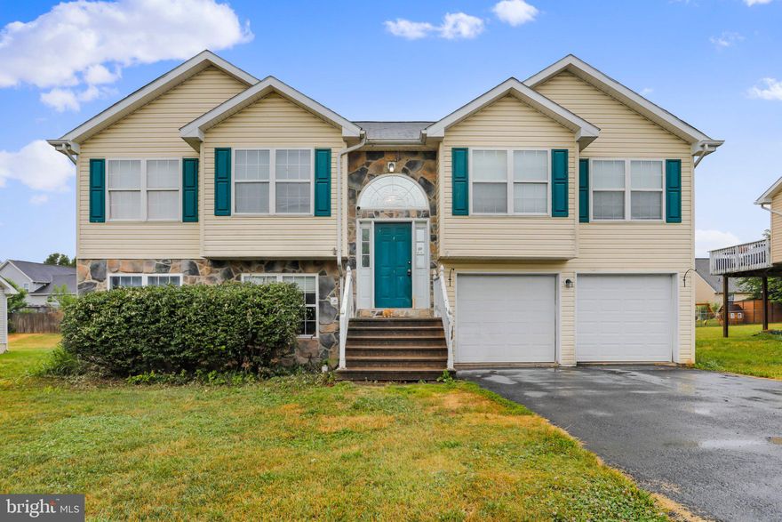 Split foyer features on the main level 3 BD-2 BA, open living area w/vaulted great room, dining & kitchen. Brand new roof in 2023.  Rear deck, large yard. Lower level finished with another 3 rooms that could be bedrooms, office, playroom, family room, and a full bath. Could use one as a 2nd master BD. 2 car garage. Rear deck. Near VA Ctr.