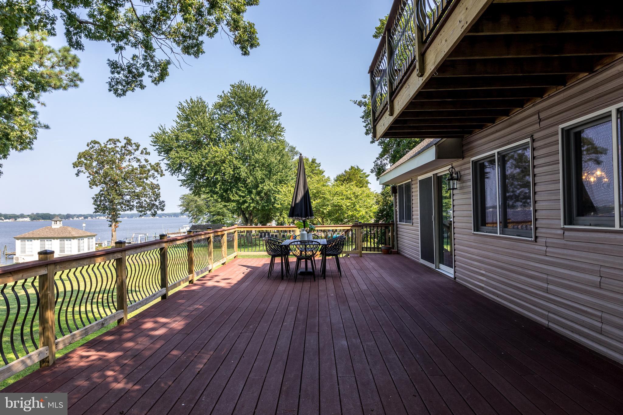 Waterfront Paradise Awaits!
Welcome to the stunning waterfront retreat you've been waiting for! Nestled at the end of a picturesque tree-lined driveway, this updated 5-bedroom, 4-bath home offers breathtaking panoramic views of Back River. Oversized lot with 77 ft of waterfrontage offers more privacy than most homes in the area.
Freshly updated throughout, this home features new carpet, luxury vinyl plank flooring, fresh paint, and newly installed pier decking and steps. New roof, too!! In addition to all this there is an attached
"in-law" suite with a separate entrance - Bonus!
Step outside to a spacious wraparound deck—ideal for sipping your morning coffee while watching the sunrise. With direct access to open waterways, this property is truly a boater’s delight. Whether you're docking your boat, enjoying water sports, or simply relaxing every day feels like a vacation here.
Don’t miss the chance to live the waterfront lifestyle you’ve always dreamed of!