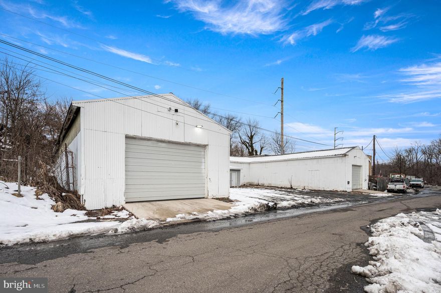Located just off Frankford Avenue with immediate access to I-95, 4220-4224 Holmesburg Ave present a versatile small-bay industrial opportunity in the highly desirable Holmesburg section of Northeast Philadelphia. The property offers approximately 4,452 square feet of drive-in warehouse space consisting of two 80’ x 21’ bays (1,680 SF each) and one 52’ x 21’ bay (1,092 SF), along with an additional 300 square foot office space suitable for administrative or support operations. One of the garage bays includes a bathroom for added convenience. The property features new garage doors, enhancing functionality and reducing immediate capital improvement needs. The 52’ bay is currently connected to one of the 80’ bays but includes its own separate garage door and can easily be demised to create an additional independent unit, allowing for flexible configurations and increased rental potential. The site also includes a 15-car parking lot, providing valuable on-site parking and outdoor utility rarely found with small-bay industrial properties in the area. One 80’ bay is currently leased at $1,500 per month, providing in-place income, while the remaining warehouse space and office area are available for lease or owner occupancy. ICMX zoning permits a wide variety of commercial and light industrial uses including contractor space, warehouse and distribution, storage, and auto-related operations. Annual real estate taxes total $4,888. Conveniently located near Frankford Avenue, Cottman Avenue, Route 1, public transportation, and South Jersey bridges, this property presents a strong opportunity for investors seeking value-add upside or for owner-users looking to secure flexible industrial space in a prime Northeast Philadelphia corridor.