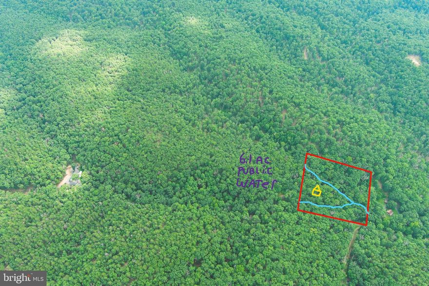 DOUBLE CREEK....6 PARK LIKE ACRES COVERED IN MASSIVE OAKS WITH 2 SEASONAL STREAMS INTERSECTING ON THE PROPERTY AND A FANTASTIC BUILDING SITE BETWEEN THE STREAMS. MINIMAL INFRASTRUCTURE COSTS....BIG SAVINGS HERE $$$$....UNDERGROUND ELECTRIC & PUBLIC WATER ONLY A FEW HUNDRED FT FROM THE BUILD SITE. BEAUTIFUL & USABLE, PERFECT FOR ARCHERY HUNTING. EASY TO GET TO BUT HARD TO FIND, LESS THAN A MILE OFF THE PAVED ROAD AND ONLY 10 MINUTES FROM MOOREFIELD.....WAL MART, MOVIES, CAR DEALERSHIPS, RESTAURANTS....IT'S A BIG SMALL TOWN. LIKE TO HUNT & FISH? 500 ACRES OF PUBLIC HUNTING A MILE AWAY, 1.5 MILES FROM LAND OWNER RIVER ACCESS AND MULTIPLE PUBLIC RIVER ACCESS POINTS WITHIN 5 MILES. VERY MINIMAL RESTRICTIONS AND NO BUILDING RESTRICTIONS....FOR ALL OF YOU THAT HAVE BEEN STRUGGLING TO FIND THE PERFECT PLACE FOR A "TINY HOME" THIS IS THE ONE! BIG HOME, LITTLE HOME, TINY HOME, SINGLE WIDE, DOUBLE WIDE, CABIN OR CAMPER...IT DOESN'T MATTER! HIGH QUALITY LOT, NICE NEIGHBORHOOD, CONVENIENT YET PRIVATE LOCATION.....A VERSATILE PROPERTY THAT'S SUITABLE FOR RECREATION OR RESIDENTIAL USE. NOT SURE WHAT MORE YOU COULD ASK FOR OR EXPECT FOR 50K THESE DAYS.....COME GET IT....THIS LOT IS MAGIC....IT'S GONNA DISAPPEAR!