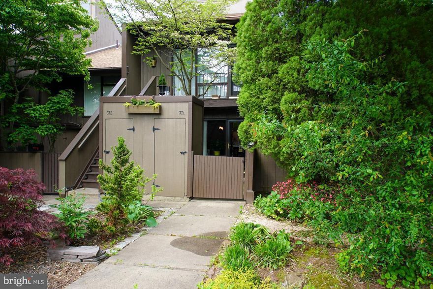 This fabulous first floor Condo in the quiet Tahoe section of Village 2 has been meticulously maintained and is available April 1st.  You are welcomed into a beautiful, private courtyard, perfect for gardening or morning coffee. The open concept floorplan with newer flooring throughout, has a centrally located eat in kitchen with newer stainless steel range. There is a spacious main floor bedroom with plenty of closet space, a nicely appointed full bath and a full size in-unit washer and dryer. You will enjoy the private, covered rear patio overlooking the woods, perfect for entertaining. There is an outdoor storage shed for bikes, sporting goods or seasonal items. Village 2 is a highly sought after, pet friendly neighborhood that includes six pools, tennis and sports courts, and swing set area. Enjoy carefree living with easy walking distance to New Hope dining, shopping and entertainment, including the newly reopened playhouse or take a stroll or bike ride into Lambertville. Easy access to Route 202 and 295. Top rated New Hope-Solebury Schools. This is a NON smoking unit.