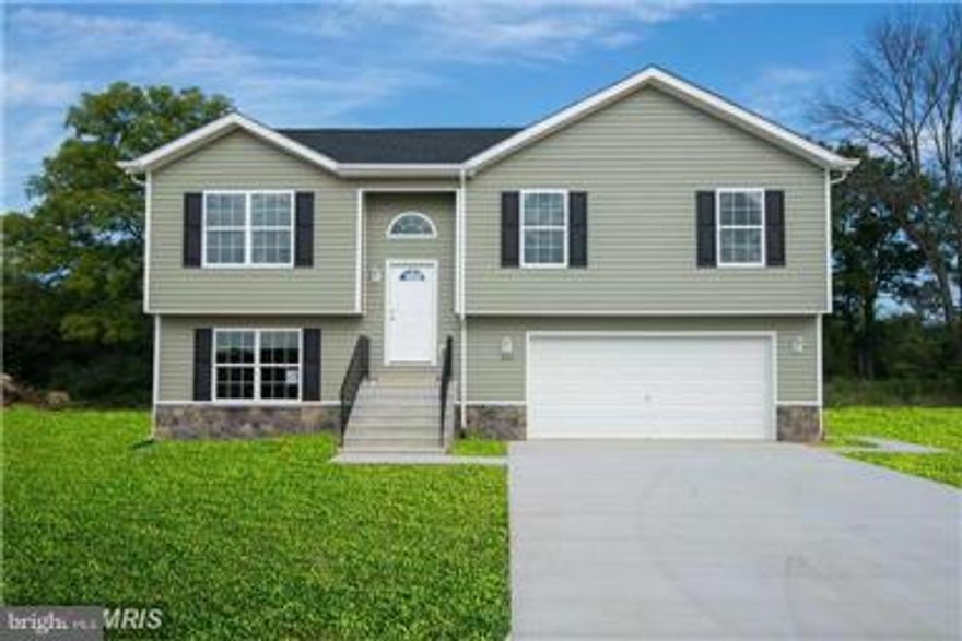 SELLER PAYS $5,000 OF BUYERS CLOSING COSTS!  This open floorplan features an ample kitchen with upgraded cabinets, dining area / large master suite with full bath, two additional bedrooms & a 2nd full bath upstairs & a large recreation room with a 3rd full bath on the lower level. Plus a 2 car garage. See virtual tour, which may show some optional features. CHOOSE YOUR LOT AND BEGIN BUILDING NOW!!