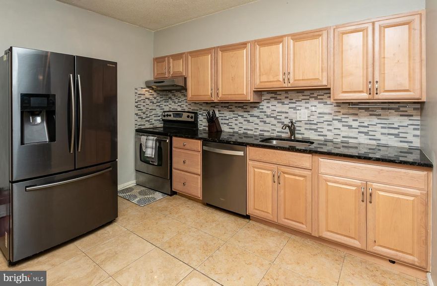 Welcome to Haverford Hill! This move-in-ready, two-bedroom, two-bathroom condo is located in the desirable Manoa section of Havertown. As you enter, you’ll find a large living room/dining room area featuring laminate floors and sliders that open onto a private balcony with a great view. The spacious eat-in kitchen boasts oak cabinets and stainless steel appliances, including a refrigerator, stove, and dishwasher. The flexible, open floor plan is perfect for entertaining. Both bathrooms have been updated, and the condo fee covers water, sewer, trash removal, snow removal, and maintenance of all common areas and the building itself. Additional amenities include a community pool (yearly membership fee), picnic tables and BBQ area, a playground, a dog walking trail, and parking for you and your guests. Common laundry facilities and personal storage space are located in the basement. 
Enjoy easy access to the Blue Route, I-95, West Chester Pike, and a Septa bus stop right at the entrance. You'll be close to Philadelphia while enjoying suburban living, and only 10 miles from the Philadelphia airport. The condo is also conveniently located near excellent restaurants and shopping, including the Manoa Shopping Center (one mile away) and is across the street from Merry Place Park and the Haverford Baseball and Recreation fields. Located within the award-winning Haverford School District, this condo offers exceptional value in a wonderful community. Haverford Township is a great place to live!