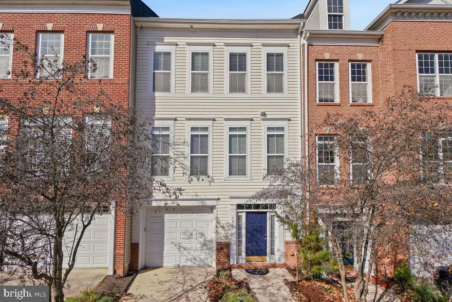 Welcome to 5416 Hartfield Avenue, an impeccably maintained and beautifully upgraded townhome, located at the Town Center at Camp Springs.  This exquisite property combines elegance with modern amenities, with numerous SMART features and quality upgrades.  This property offers 3 bedrooms and 3.5 baths spread out over 3 finished levels.  The main level, which encompasses the living/dining areas, a recently remodeled half bath and gourmet kitchen, perfectly blends comfort and functionality that is ideal for entertaining:  An open floor plan, high ceilings and an abundance of floor to ceiling windows that flood the home with natural light.  The kitchen is a Chef's delight anchored by an island cooktop/downdraft with multiple interchangeable cooking surfaces - griddle, grill & ceramic/coil cooking options - -- commercial grade Samsung SMART double ovens with Twin Flex functionality, Samsung French Door refrigerator, Samsung built-in microwave, granite countertops, undermount double sinks, mosaic tile backsplash, upgraded Cherry cabinets, under cabinet lighting, as well as a large food pantry.  The spacious kitchen can accommodate a large gathering table or a cozy seating arrangement.  Retreat to the upper level of the home to the primary bedroom with an en-suite bath with soaking tub, separate shower and double vanity.  Two additional generous sized bedrooms, another full bath, and a laundry closet (LG front loading washer/dryer convey) complete this level.  Not to be overlooked is the finished basement which contains a cozy family room with gas fireplace and rear exit, an additional full bath, a compact utility room, and the garage entry.  The garage offers additional overhead storage, storage racks and an EV outlet/receptable.   The major systems and appliance upgrades will save you $$$$ in energy/maintenance costs for years to come and include:  Hardwood floors in all living areas, professionally painted (2024), HVAC system - furnace & A/C unit --  w/SMART thermostat (2024), 74-gallon water heater/anode rod (2018/2020), roof with transferrable 5-year builder warranty/40-year shingle warranty (2024), remodeled half bath (2024), new farmhouse lighting fixtures (2024), refrigerator/icemaker, microwave, double ovens (2020).  For your added comfort and convenience, enjoy the whole house 3-stage water filtration system, the reverse osmosis water system beneath the kitchen sink, the security system w/3 panels and 2 remotes, the 3 exterior security cameras with monitor and DVR, the Wi-Fi enabled wall switches, outlet and ceiling mounted speaker, and the four Hunter ceiling fans with remotes, all of which convey with this home.  A plethora of community amenities are available, for an additional fee, and include a community clubhouse with controlled access, wi-fi center, media center, conference room, entrainment kitchen, fitness center, indoor basketball/sports court, tennis courts, pic/grilling area, pool/sundeck, and kid's playground.  The community offers retail establishments and dining options on site at Restaurant Row.  Say goodbye to long commutes as this home is ideally located within a 4-minute drive/10-miute walk to the Green Line Branch Avenue Metro Rail, as well as easy access to I-95, 495, 295, Joint Base Andrews, the National Harbour, Washington, DC and Old Town Alexandria.  This home is truly turn-key, ready for immediate occupancy, and won't last long!!!