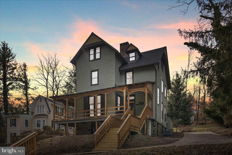 LOCATION, LOCATION, LOCATION!!  Welcome Home to 6114 Smith Avenue!!  This BEAUTIFULLY updated home located in sought after Mt. Washington.  Featuring 5 Bedrooms, 3.5 Bathrooms this home has the space you need to create a life you desire!!  Large wrap around covered porch is perfect for relaxation!  Boasting an array of sleek finishes throughout, this home has so much to offer in it's 4 stories of finished space.  The main level offers a spacious living room, dining room, kitchen, full bathroom and screened in porch.  Kitchen boasts large island with seating, Quartz Counters, S/S appliances, shaker cabinets, pot filler, ceramic tile back splash and MORE!  Cozy up next to the fireplace in your spacious Livingroom.  The 2nd floor offers 3 large bedrooms and 2 full bathrooms.  The Primary bedroom features an attached primary bathroom and walk-in closet.  Primary bathroom  features a claw foot tub, stall shower, all new ceramic tile and fixtures.  The 3rd floor features 2 additional bedrooms, 3rd full bathroom and an office.  The basement has been fully finished to include a large rec room perfect for entertaining and dry bar with close by plumbing to easily convert to a wet bar.   Large parking pad/driveway.  This home is just blocks from Mt. Washington Village dining, shopping and fun!  Close proximity to light rail, 83 and MORE!  Book your private showing today before it's gone!!